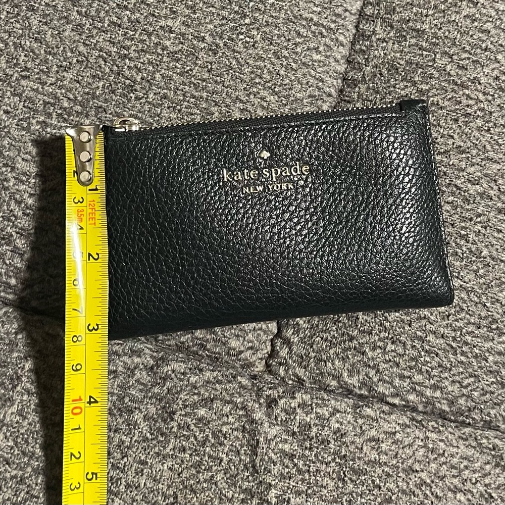 KATE SPADE - NEVER USED. Small wallet fits smaller crossbody or pocket. - Picture 8 of 9